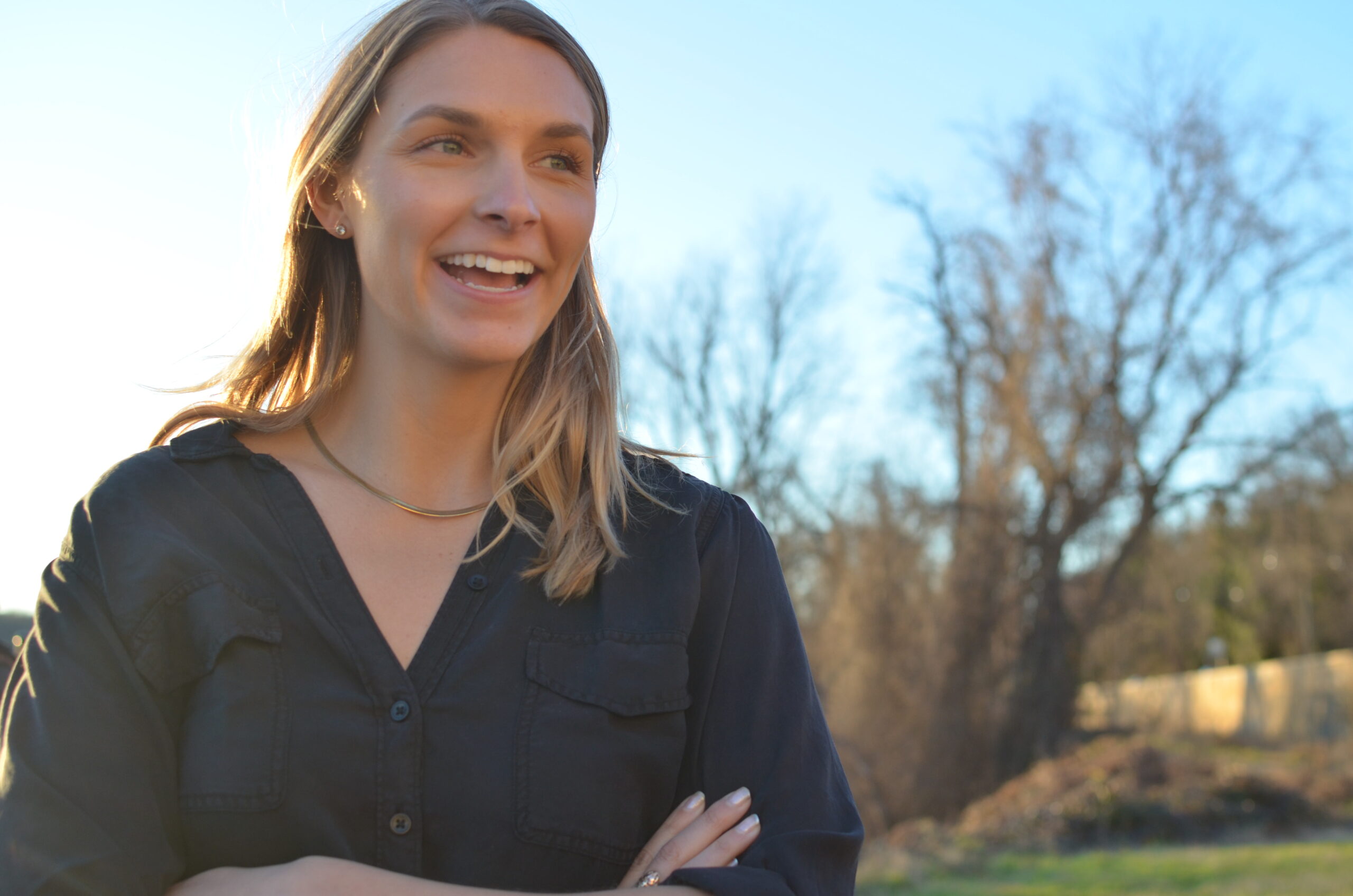 Young blonde woman stares alluringly at camera