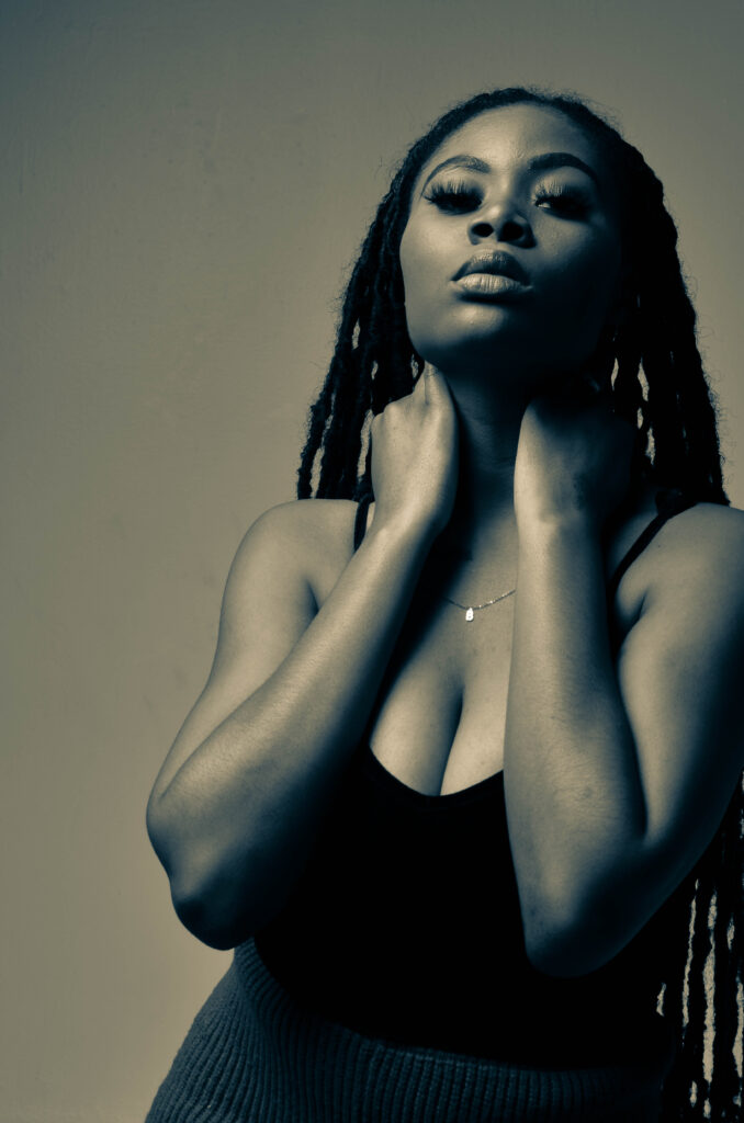 Stylish young woman poses for the camera